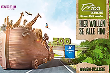 Werbeillustration von Evonik und dem Zoo Duisburg. Die Arche Noah auf Rädern mit Tieren fährt die Autobahn entlang. Ein blaues Autobahnschild kündigt die Abufahrt Zoo Duisburg in 500m an. Text: Hier wollen se alle hin!